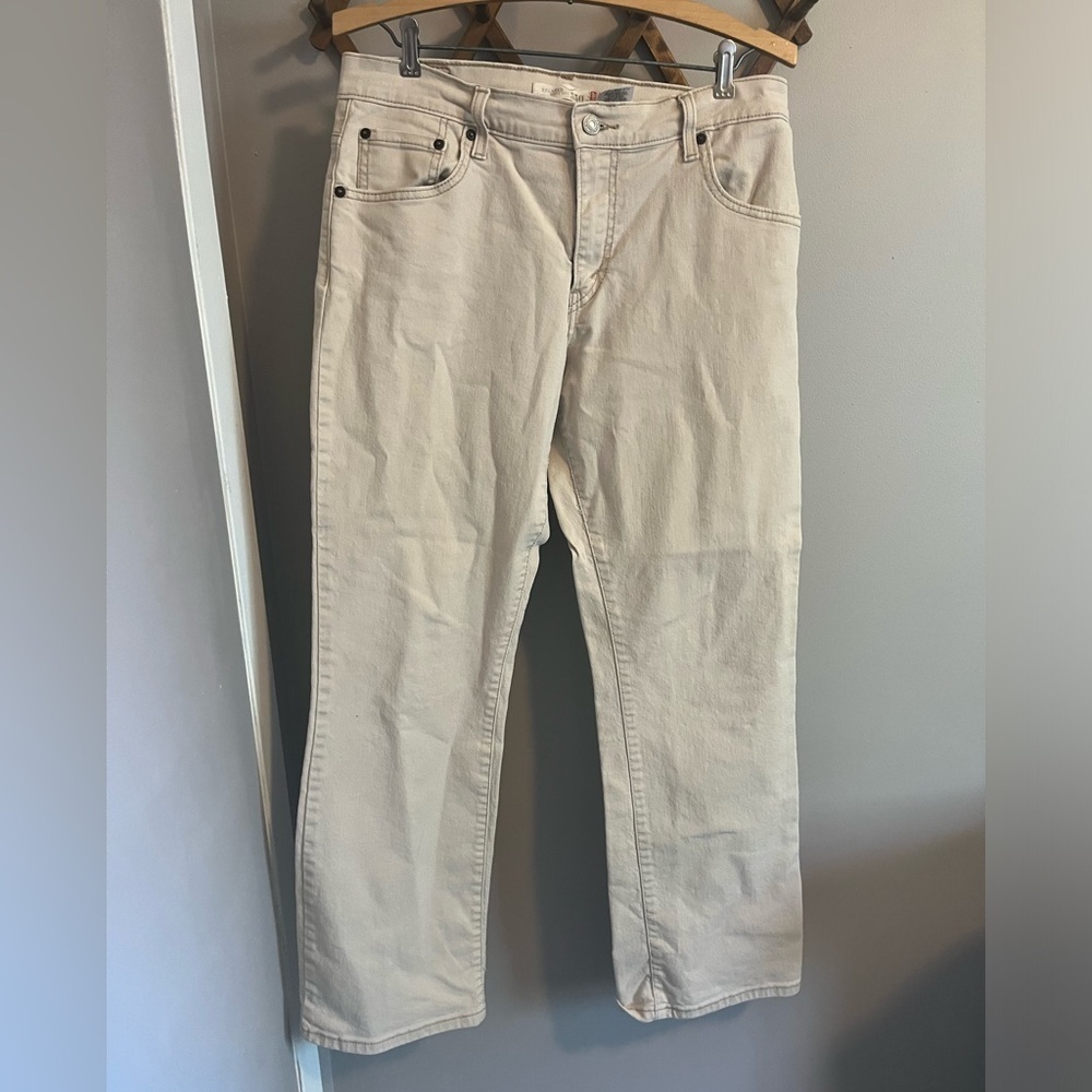 Levi’s 550 light beige relaxed fit boot cut jeans size 12 neutral